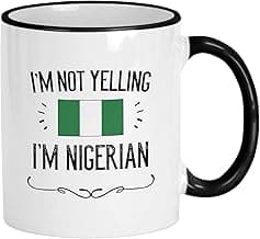Casitika Funny Nigeria Flag Mug. I'm Not Yelling I'm Nigerian Coffee Cup. Gift Idea for Proud Men and Women Featuring the Country Flag. (11 oz Black Handle/Rim)